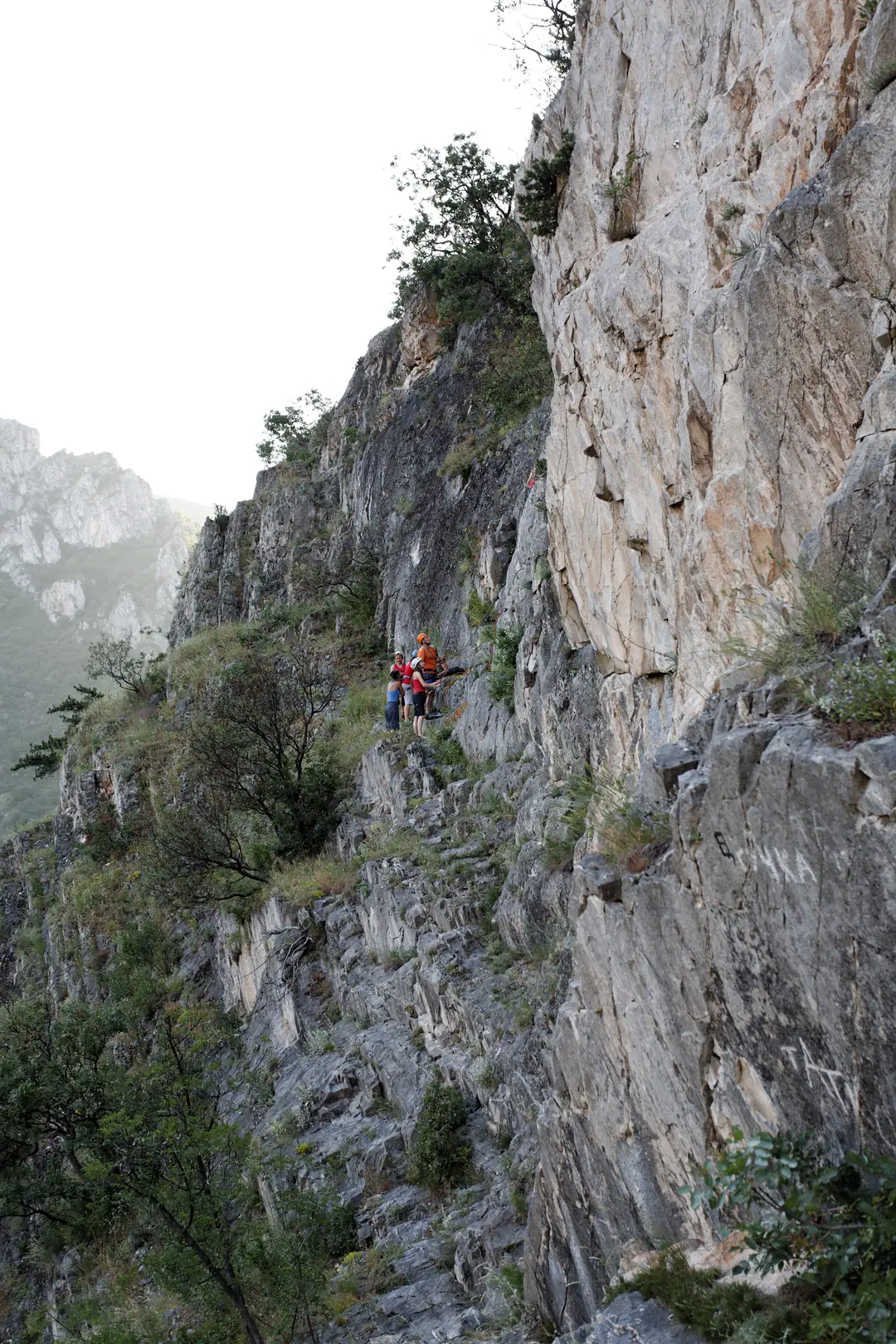 Climber on the high limestone walls of Matka Canyon