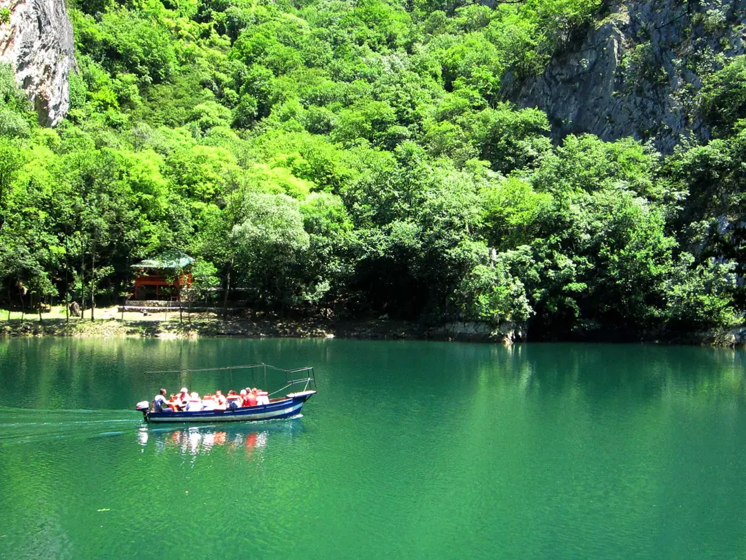 Boat on the emerald lake in Matka Canyon